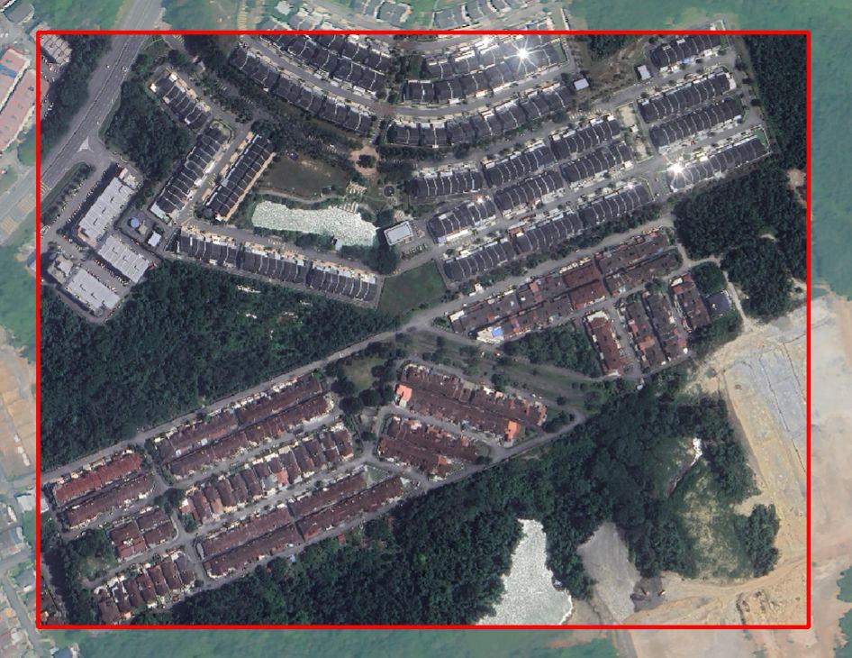 Satellite image of rows of terrace houses beside a forested hill