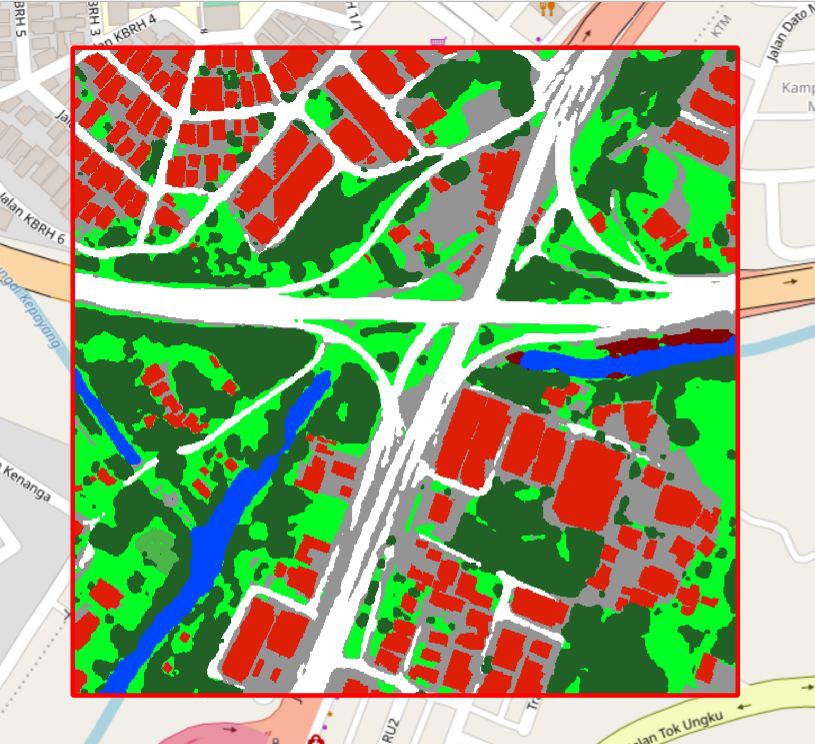 The same area classified: the interchange in white, the river in blue